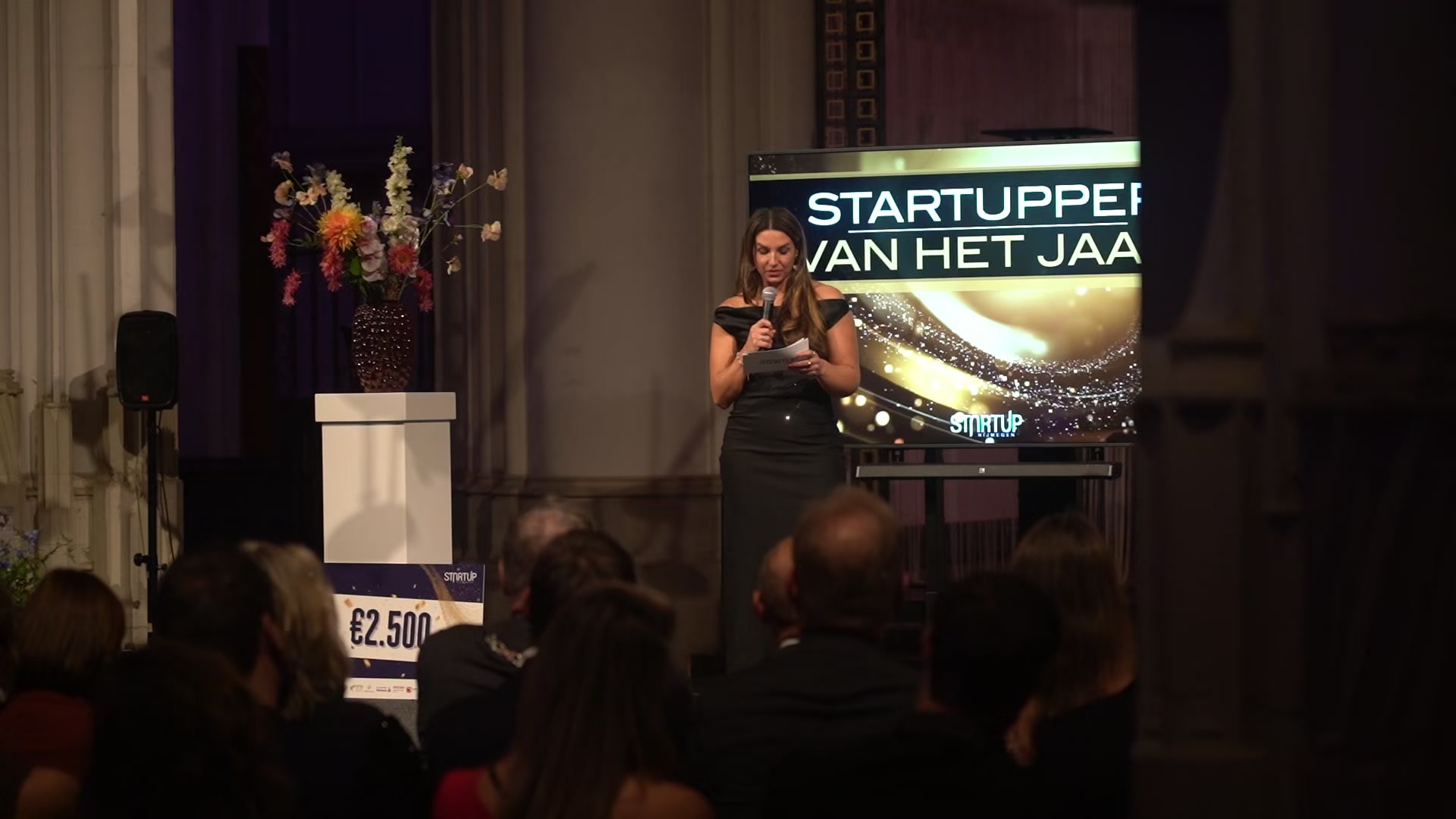 Carola Rodrigues Lopes spreekt op het podium tijdens de Startupper van het Jaar awards